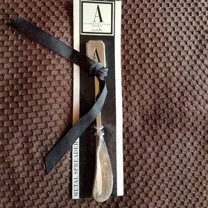Initial A spreader